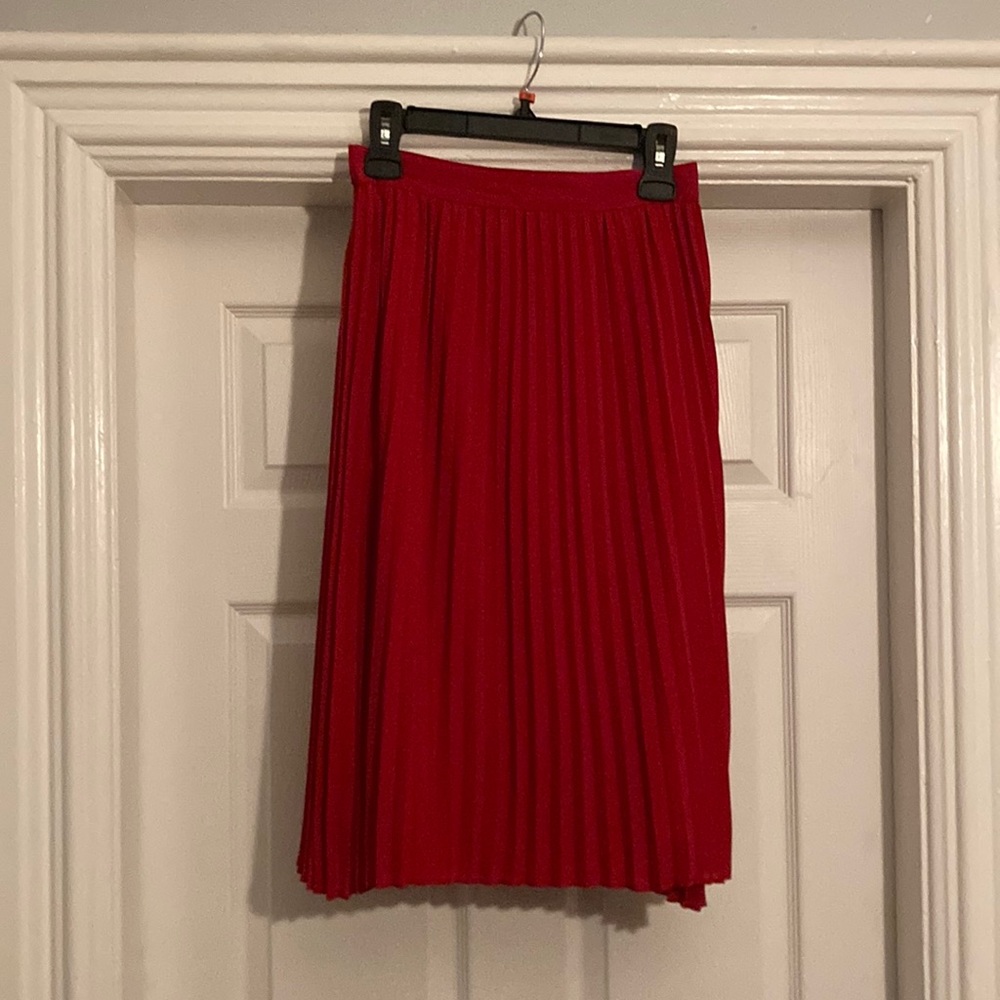 A New Day - Red high-waisted pleated skirt.